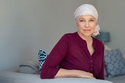 mature woman with cancer from Zantac in headscarf